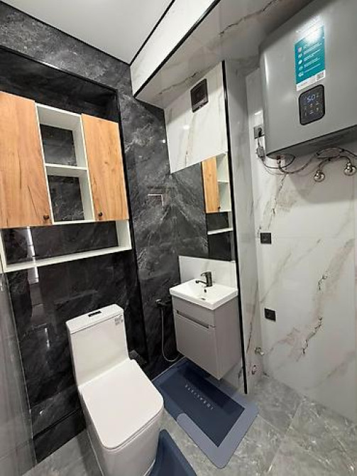 2 комнаты, 51 м², Боконбаева/Уметалиева Элитка, 8 этаж, Дизайнерский ремонт Бишкек - изображение 2